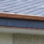 instalación de canalón de cobre en tejado de pizarra